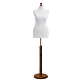 White female dressmakers dummy with dark wood round base, adjustable height, ideal for sewing, tailoring, and display.